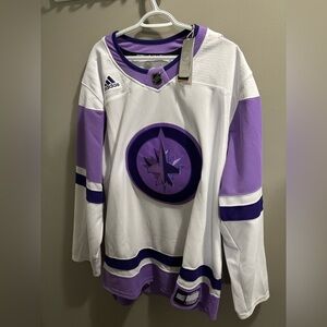 Brand new with tags Winnipeg Jets Hockey fights Cancer jersey 3XL